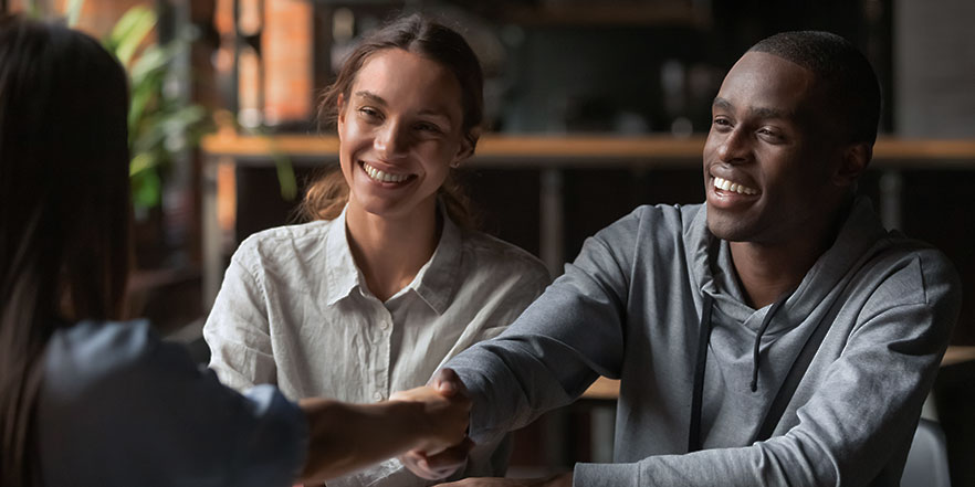 Business owners getting a loan - SBA Loan Resources